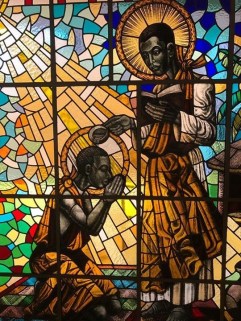 St._Kizito_being_baptised_by_St._Charles_Lwanga_at_Munyonyo